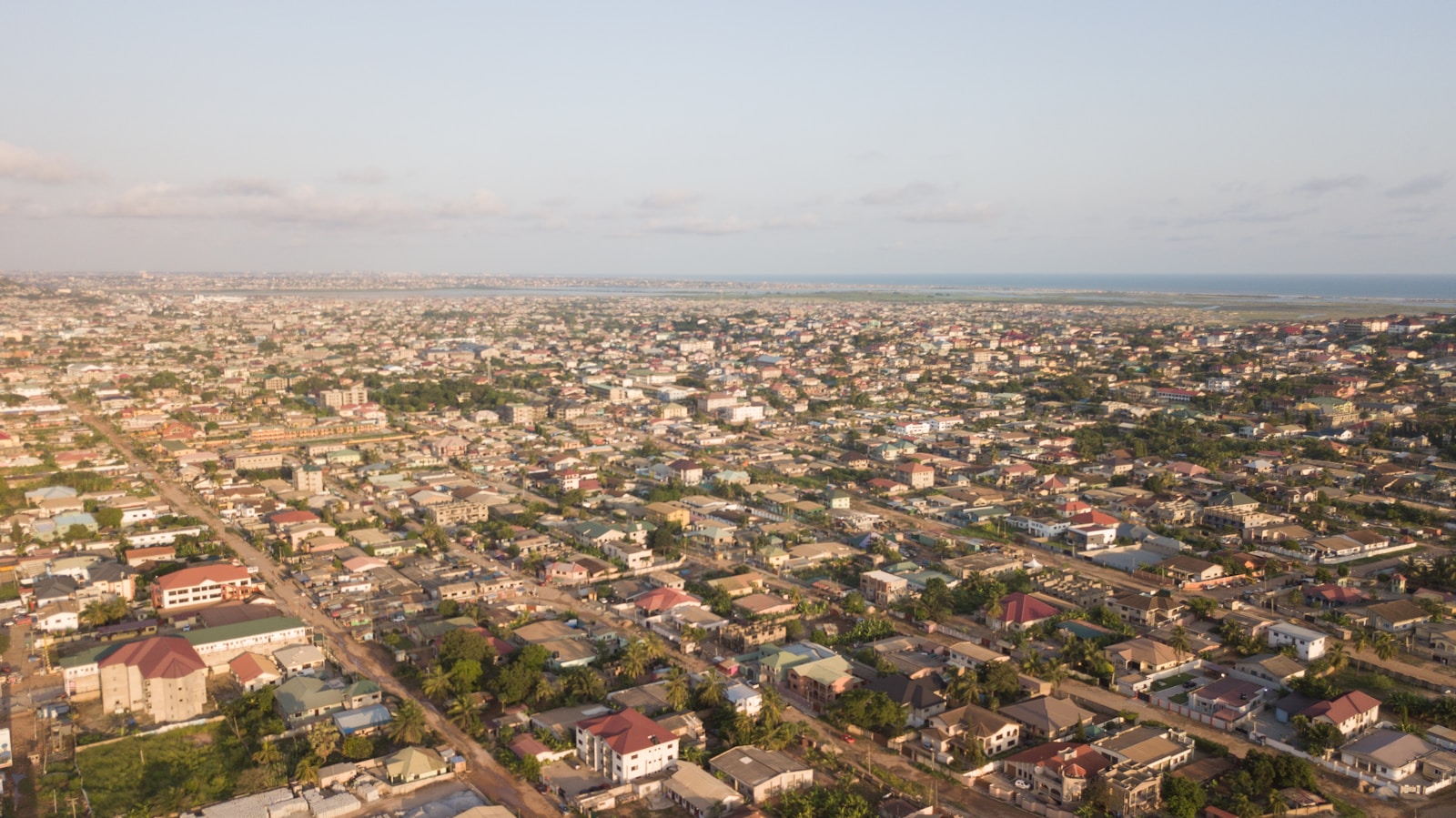 an aerial view of a city with lots of houses